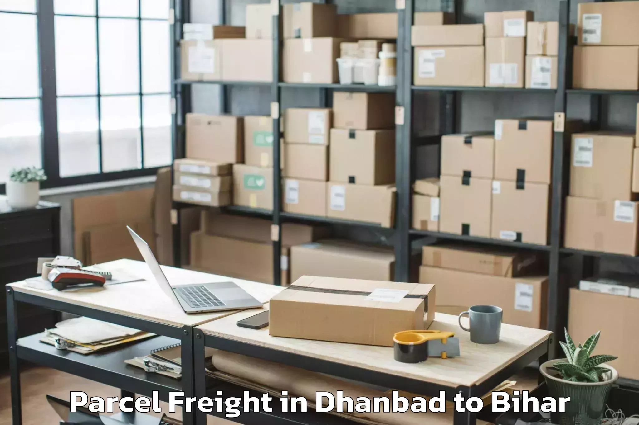 Easy Dhanbad to Karai Parsurai Parcel Freight Booking